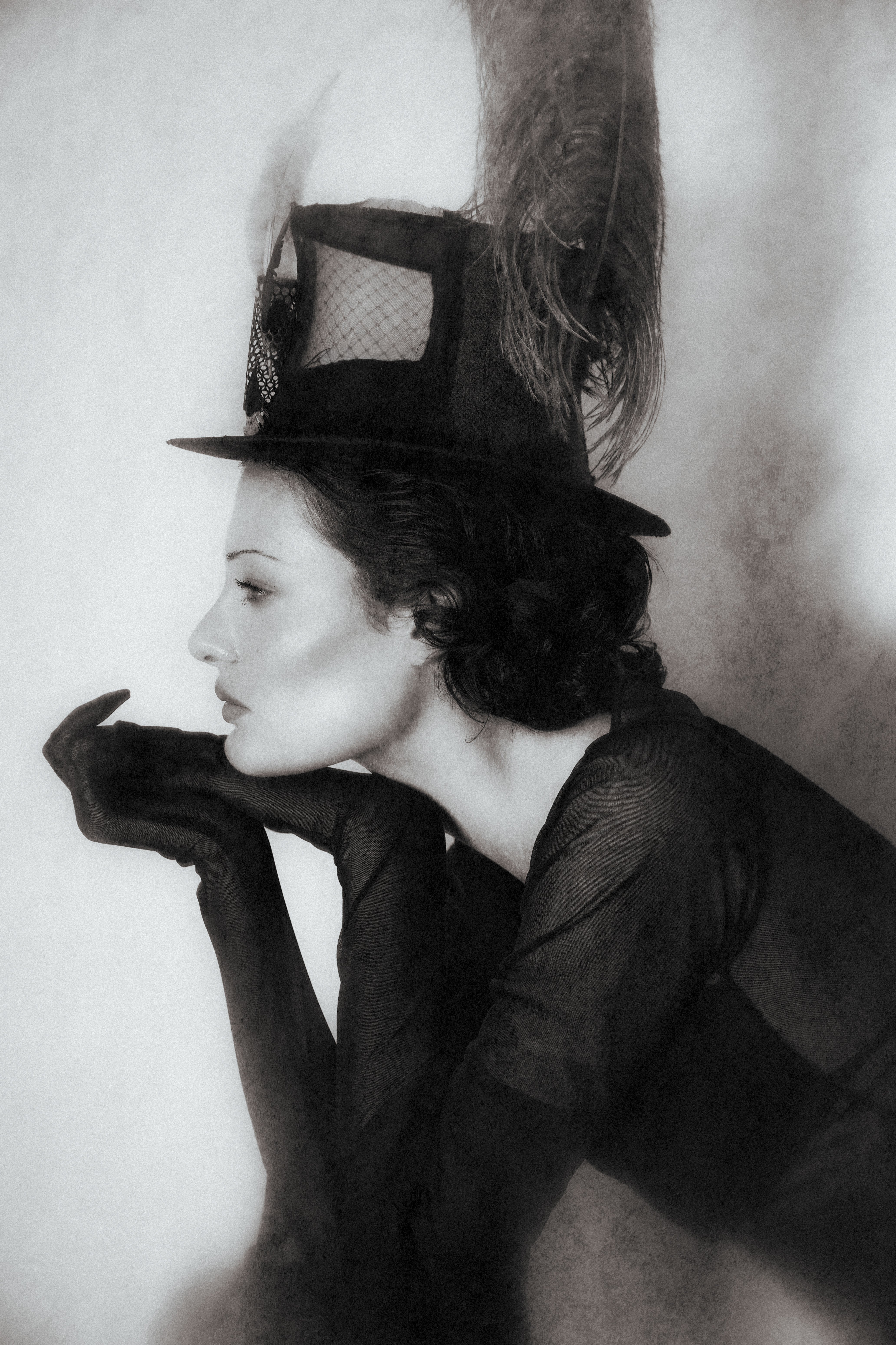 Audrey Sciorilli in profile with Roman's feathered hat